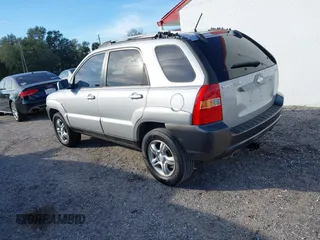2005 Kia Sportage LX z VIN KNDJF723X57077945, wystawiony jako IAAI lot #41431249 z przebiegiem 145 334 mil mil oraz . Historia ofert i sprzedaży dostępna na DreamBid. Obrazek 3.