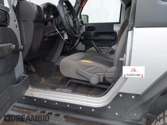 2007 Jeep Wrangler X with VIN 1J4FA24117L142513, listed as a IAAI auction lot 42314284 with 70,213 mi miles and . Bid and sale history available at DreamBid. Image 6.