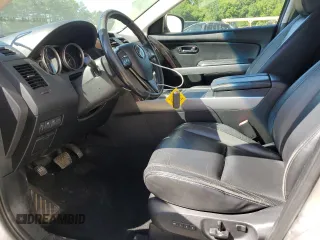 2012 Mazda CX-9 Grand Touring z VIN JM3TB3DV3C0335330, wystawiony jako Copart lot #57562015 z przebiegiem 171 397 mil mil oraz Szkody całkowita. Historia ofert i sprzedaży dostępna na DreamBid. Obrazek 7.