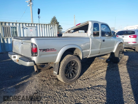 2003 Toyota Tacoma with VIN 5TEWN72N93Z240875, listed as a IAAI auction lot 41539686 with 169,249 mi miles. Bid and sale history available at carsss.com. Image 4.