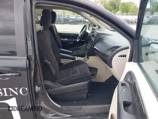 2014 Dodge Grand Caravan SXT z VIN 2C4RDGCGXER388459, wystawiony jako IAAI lot #42350937 z przebiegiem 149 276 mil mil oraz . Historia ofert i sprzedaży dostępna na DreamBid. Obrazek 5.