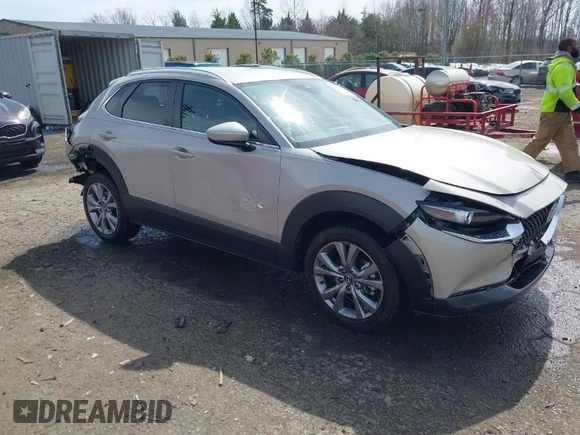 2022 Mazda CX-30 S Select with VIN 3MVDMBBL4NM401563, listed as a IAAI auction lot 41826878 with 4,733 mi miles and . Bid and sale history available at carsss.com. Image 1.