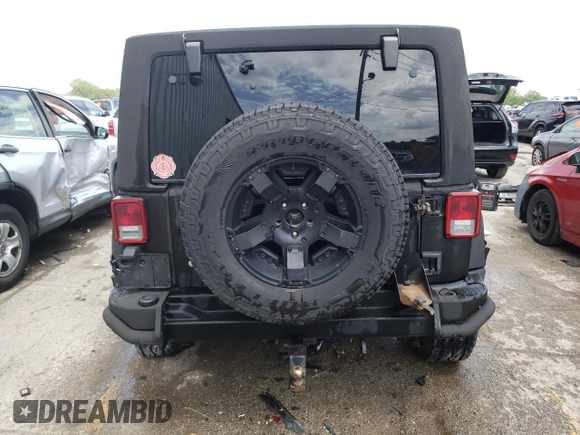 2013 Jeep Wrangler Unlimited Rubicon 10th Anniversary with VIN 1C4HJWFGXDL543660, listed as a Copart auction lot 61462104 with 115,897 mi miles and Salvage title. Bid and sale history available at DreamBid. Image 6.