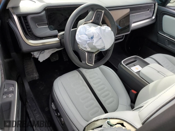 2025 Rivian R1T Adventure z VIN 7FCTGBAA6SN035587, wystawiony jako Copart lot #49142625 z przebiegiem Nie podano mil oraz Szkody całkowita. Historia ofert i sprzedaży dostępna na DreamBid. Obrazek 8.