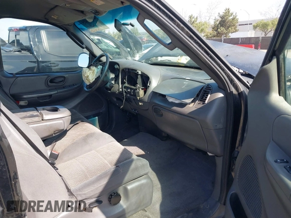 2002 Ford F-150 XL with VIN 1FTRX17L02NB79722, listed as a IAAI auction lot 41538404 with 202,050 mi miles. Bid and sale history available at carsss.com. Image 5.