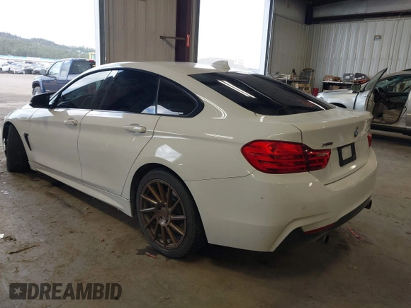 2015 BMW 4 Series 435i xDrive z VIN WBA4B3C53FD669771, wystawiony jako IAAI lot #41835401 z przebiegiem 145 570 mil mil oraz . Historia ofert i sprzedaży dostępna na DreamBid. Obrazek 3.