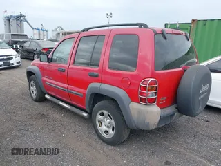 2003 Jeep Liberty Sport with VIN 1J4GL48K23W660989, listed as a IAAI auction lot 40370765 with 166,297 mi miles. Bid and sale history available at carsss.com. Image 3.