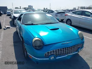 2004 Ford Thunderbird Deluxe with VIN 1FAHP60A14Y106321, listed as a IAAI auction lot 42086505 with 1 mi miles. Bid and sale history available at carsss.com. Image 1.