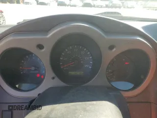 2002 Nissan Frontier SE z VIN 1N6ED27T42C319065, wystawiony jako Copart lot #74206474 z przebiegiem 147 724 mil mil oraz Szkoda całkowita • Salvage title. Historia ofert i sprzedaży dostępna na DreamBid. Obrazek 9.
