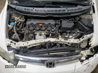 2006 Honda Civic LX z VIN 1HGFA16556L113760, wystawiony jako Copart lot #58132265 z przebiegiem 193 592 mil mil oraz Szkoda całkowita • Salvage title. Historia ofert i sprzedaży dostępna na DreamBid. Obrazek 11.