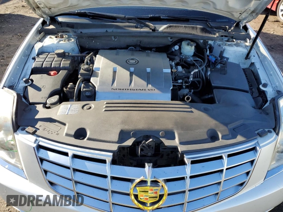 2011 Cadillac DTS z VIN 1G6KA5E6XBU109774, wystawiony jako Copart lot #45548595 z przebiegiem 90 356 mil mil oraz Szkoda całkowita • Salvage title. Historia ofert i sprzedaży dostępna na DreamBid. Obrazek 11.