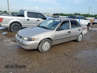 1999 Toyota Corolla VE with VIN 1NXBR12E0XZ215258, listed as a Copart auction lot 60704095 with Not provided miles and Salvage title. Bid and sale history available at DreamBid. Image 1.