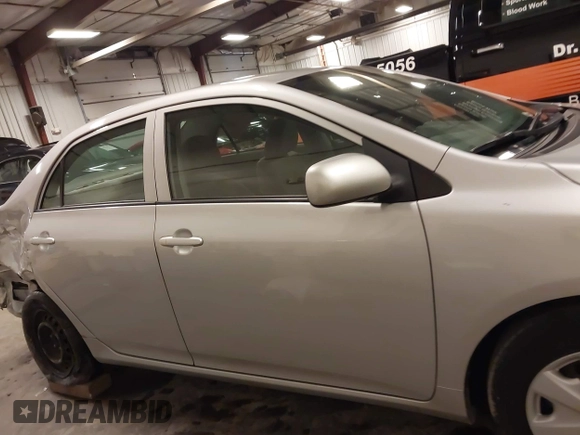 2009 Toyota Corolla with VIN 1NXBU40E69Z129314, listed as a IAAI auction lot 41718098 with 170,739 mi miles. Bid and sale history available at carsss.com. Image 14.