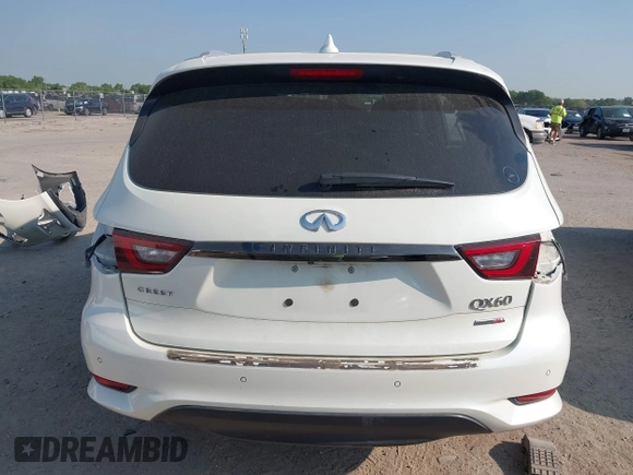 2020 Infiniti QX60 Luxe z VIN 5N1DL0MN7LC525683, wystawiony jako IAAI lot #42022763 z przebiegiem 70 575 mil mil oraz . Historia ofert i sprzedaży dostępna na DreamBid. Obrazek 16.