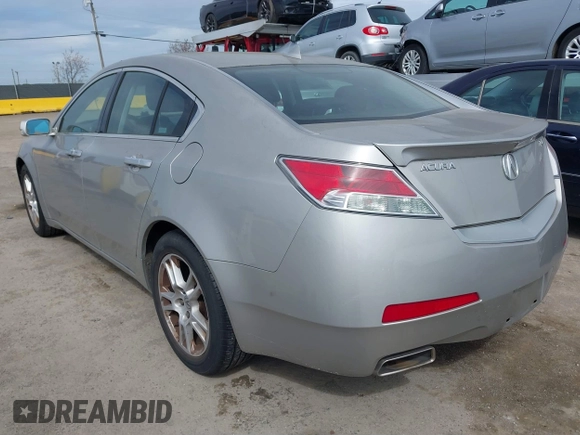 2009 Acura TL Tech with VIN 19UUA86529A012577, listed as a IAAI auction lot 41852402 with 152,416 mi miles. Bid and sale history available at carsss.com. Image 3.