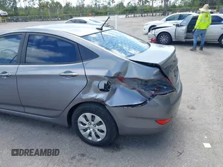 2015 Hyundai Accent GLS with VIN KMHCT4AE8FU861963, listed as a IAAI auction lot 42161059 with 132,629 mi miles and . Bid and sale history available at DreamBid. Image 6.