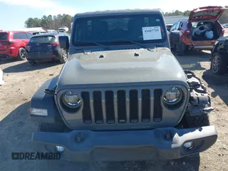 2021 Jeep Wrangler Unlimited Willys with VIN 1C4HJXDM6MW587152, listed as a IAAI auction lot 41687729 with 59,730 mi miles and . Bid and sale history available at DreamBid. Image 12.