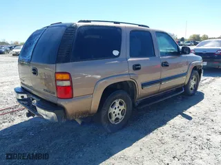 2003 Chevrolet Tahoe LT with VIN 1GNEC13Z33R190168, listed as a IAAI auction lot 41858522 with 359,289 mi miles. Bid and sale history available at carsss.com. Image 4.