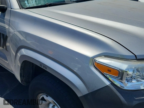 2019 Toyota Tacoma SR with VIN 5TFRX5GN1KX143485, listed as a IAAI auction lot 42763045 with 90,847 mi miles and . Bid and sale history available at DreamBid. Image 8.
