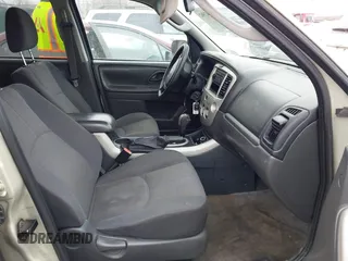 2005 Mazda Tribute i with VIN 4F2YZ02Z35KM57658, listed as a IAAI auction lot 41547562 with 131,303 mi miles and . Bid and sale history available at carsss.com. Image 5.