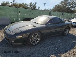 1992 Mitsubishi 3000GT z VIN JA3XE74CXNY052868, wystawiony jako Copart lot #81620654 z przebiegiem 124 361 mil mil oraz Szkody całkowita. Historia ofert i sprzedaży dostępna na DreamBid. Obrazek 1.