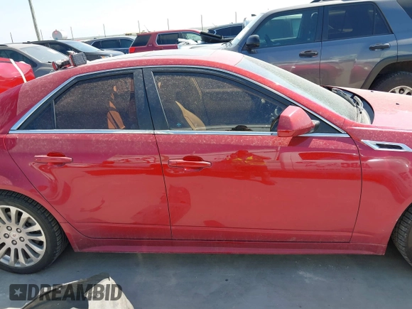 2012 Cadillac CTS Premium z VIN 1G6DP5E3XC0116312, wystawiony jako IAAI lot #41804403 z przebiegiem 148 570 mil mil oraz . Historia ofert i sprzedaży dostępna na DreamBid. Obrazek 13.