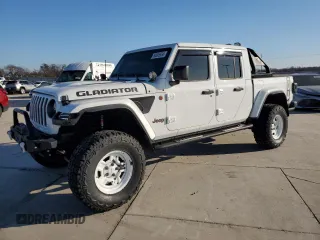 2022 Jeep Gladiator Rubicon с VIN 1C6JJTBG5NL152818, выставлен на аукционе Copart как лот 80095554 с пробегом 9 579 миль миль и Списание • Salvage title. История ставок и продаж доступна на DreamBid. Изображение 1.
