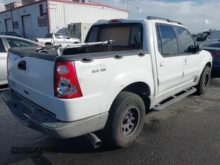 2002 Ford Explorer Sport Trac Value with VIN 1FMZU67E92UD16987, listed as a IAAI auction lot 41419841 with 243,176 mi miles and . Bid and sale history available at DreamBid. Image 4.