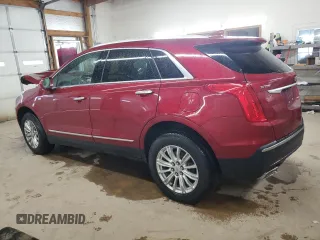 2019 Cadillac XT5 FWD with VIN 1GYKNARS8KZ253290, listed as a Copart auction lot 54786695 with 109,405 mi miles and Clean title. Bid and sale history available at DreamBid. Image 2.