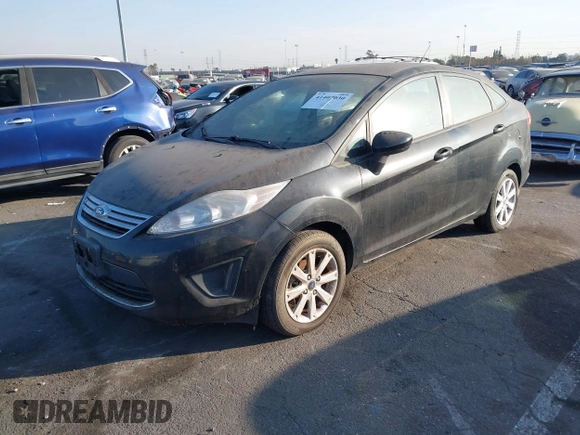 2011 Ford Fiesta SE with VIN 3FADP4BJ1BM216925, listed as a IAAI auction lot 41407030 with 108,459 mi miles. Bid and sale history available at carsss.com. Image 2.