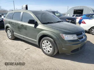 2017 Dodge Journey SE with VIN 3C4PDCAB6HT637705, listed as a Copart auction lot 48400265 with 145,398 mi miles and Salvage Title. Bid and sale history available at DreamBid. Image 4.