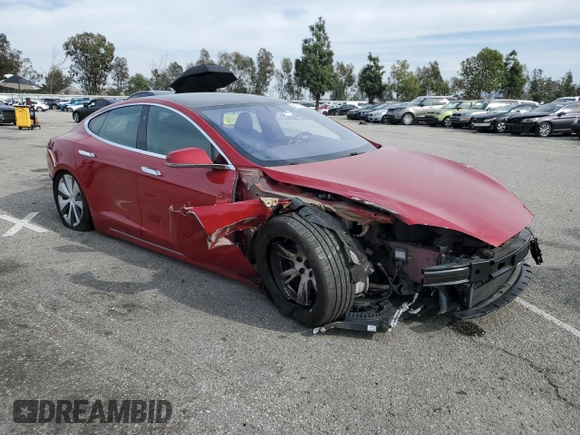 2020 Tesla Model S Long Range with VIN 5YJSA1E22LF401139, listed as a Copart auction lot 44770285 with 128,685 mi miles and Salvage title. Bid and sale history available at DreamBid. Image 4.