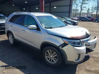 2014 Kia Sorento LX with VIN 5XYKT4A63EG457302, listed as a IAAI auction lot 41859779 with 122,724 mi miles. Bid and sale history available at carsss.com. Image 1.
