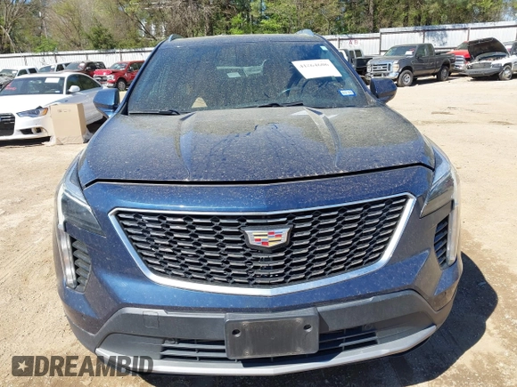 2019 Cadillac XT4 FWD Premium Luxury z VIN 1GYFZCR47KF109394, wystawiony jako IAAI lot #41864606 z przebiegiem 98 425 mil mil oraz . Historia ofert i sprzedaży dostępna na DreamBid. Obrazek 12.