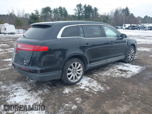 2011 Lincoln MKT with VIN 2LMHJ5AR5BBJ52058, listed as a IAAI auction lot 41305955 with 193,555 mi miles and . Bid and sale history available at DreamBid. Image 4.