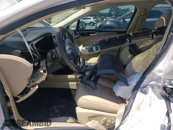 2015 Ford Fusion SE Hybrid z VIN 3FA6P0LU8FR105615, wystawiony jako Copart lot #61451155 z przebiegiem 106 778 mil mil oraz Szkoda całkowita • Salvage title. Historia ofert i sprzedaży dostępna na DreamBid. Obrazek 7.