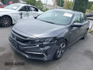 2020 Honda Civic LX z VIN 2HGFC2F60LH596396, wystawiony jako IAAI lot #42354812 z przebiegiem 62 082 mil mil oraz . Historia ofert i sprzedaży dostępna na DreamBid. Obrazek 17.