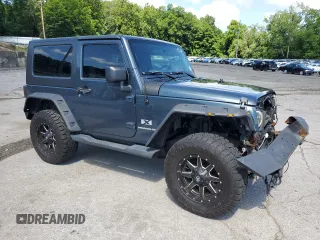 2007 Jeep Wrangler X with VIN 1J4FA24117L170294, listed as a Copart auction lot 64806715 with 132,130 mi miles and Salvage title. Bid and sale history available at DreamBid. Image 4.
