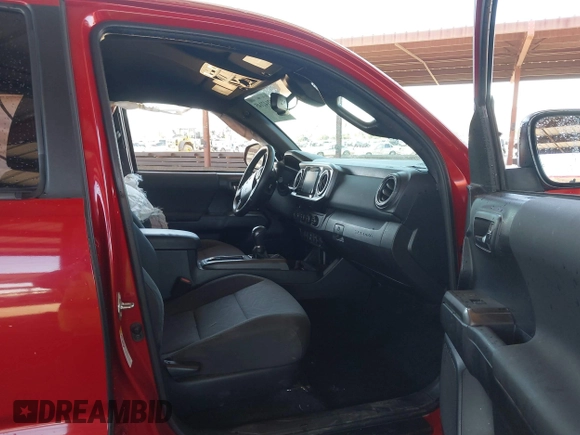 2018 Toyota Tacoma SR with VIN 3TMCZ5AN8JM141486, listed as a IAAI auction lot 42142145 with 54,851 mi miles and . Bid and sale history available at DreamBid. Image 5.