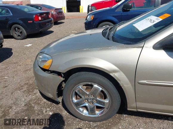 2002 Dodge Stratus z VIN 1B3AL56R62N154704, wystawiony jako IAAI lot #41879628 z przebiegiem 91 193 mil mil oraz . Historia ofert i sprzedaży dostępna na DreamBid. Obrazek 6.