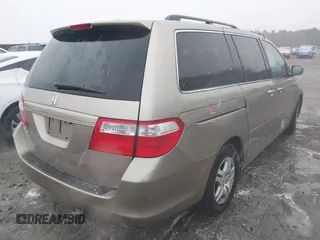 2007 Honda Odyssey EX-L with VIN 5FNRL38707B083040, listed as a IAAI auction lot 41624797 with 256,475 mi miles. Bid and sale history available at carsss.com. Image 4.
