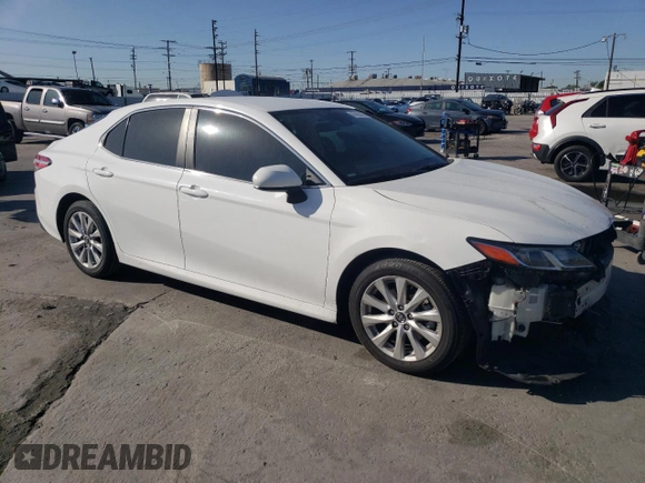 2020 Toyota Camry LE with VIN 4T1C11AK5LU944417, listed as a Copart auction lot 47455145 with 52,562 mi miles and Salvage Title. Bid and sale history available at DreamBid. Image 4.