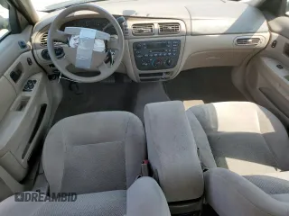 2005 Ford Taurus SE z VIN 1FAHP53U65A184099, wystawiony jako Copart lot #60960015 z przebiegiem Nie podano mil oraz Szkoda całkowita • Salvage title. Historia ofert i sprzedaży dostępna na DreamBid. Obrazek 8.