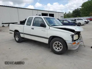 1995 Toyota T100 DX with VIN JT4VD12E2S0009844, listed as a Copart auction lot 51738525 with 357,475 mi miles and Salvage Title. Bid and sale history available at carsss.com. Image 4.