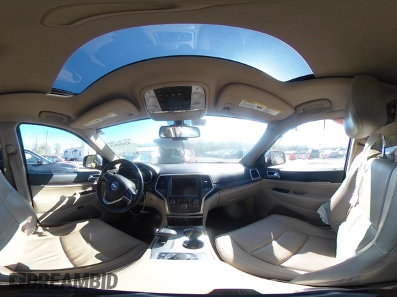 2014 Jeep Grand Cherokee Limited with VIN 1C4RJFBT3EC195354, listed as a IAAI auction lot 42031013 with 168,304 mi miles and . Bid and sale history available at DreamBid. Image 18.