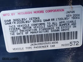 2005 Mitsubishi Lancer ES with VIN JA3AJ26E65U014838, listed as a IAAI auction lot 41310586 with 127,487 mi miles. Bid and sale history available at carsss.com. Image 9.