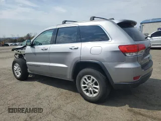 2018 Jeep Grand Cherokee Laredo E with VIN 1C4RJFAG0JC351090, listed as a Copart auction lot 52958635 with 96,956 mi miles and Salvage Title. Bid and sale history available at DreamBid. Image 2.