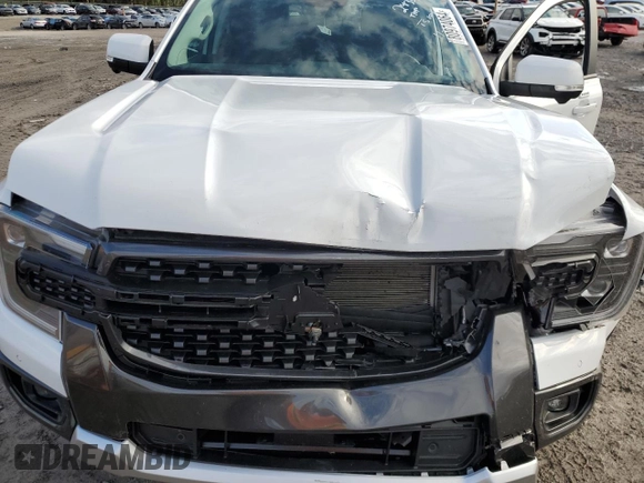 2024 Ford Ranger LARIAT with VIN 1FTER4KH8RLE25001, listed as a Copart auction lot 80974064 with 9,026 mi miles and Salvage Title. Bid and sale history available at carsss.com. Image 13.