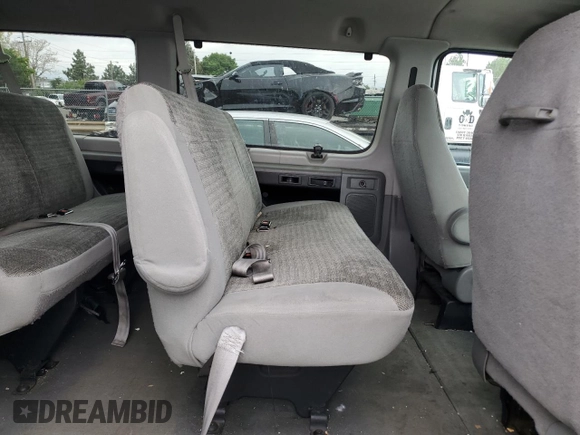 2003 Ford Econoline Passenger XL z VIN 1FBSS31S03HA36687, wystawiony jako Copart lot #66855044 z przebiegiem 239 504 mil mil oraz Szkoda całkowita • Salvage title. Historia ofert i sprzedaży dostępna na DreamBid. Obrazek 11.