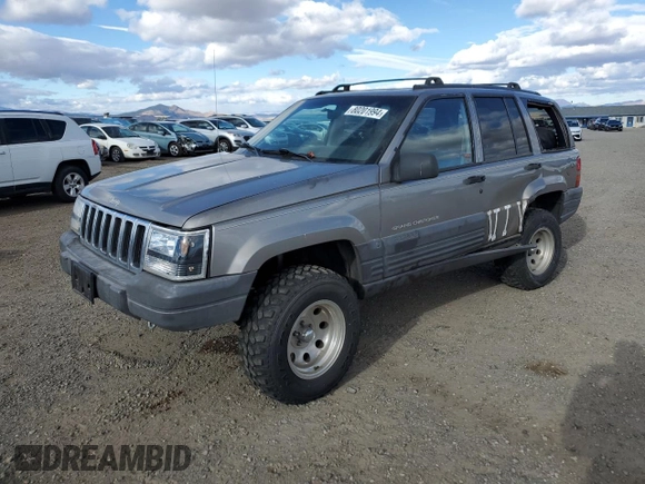 1998 Jeep Grand Cherokee Laredo with VIN 1J4GZ58S7WC316522, listed as a Copart auction lot 80201994 with 217,465 mi miles and Clean Title. Bid and sale history available at carsss.com. Image 1.